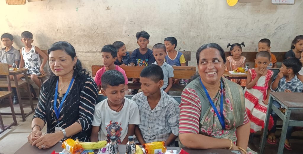 Children and teachers in a classroom at Catch You Young